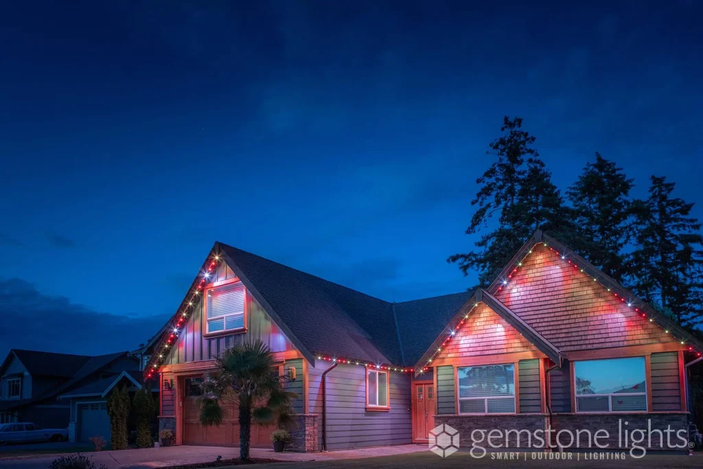 Charming house decorated with colorful holiday lights, reflecting our about us spirit